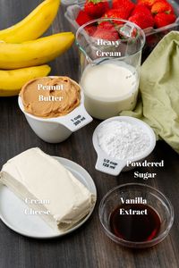 Ingredients for creamy peanut butter dip in white and glass containers.