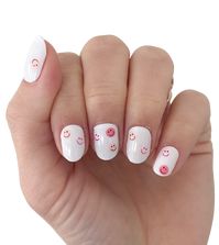 The smile's the limit for this milky white scattered smiley face nail polish wrap.