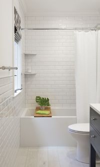 white bevel subway tile bathroom