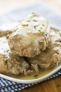 Say goodbye to overcooked pork chops! These Slow Cooker Pork Chops are the perfect weeknight and back-to-school meal! Only 3 ingredients and with minimal work, this recipe leaves you with pork chops that are fall-apart tender and savory and delicious juices that make a fantastically savory gravy!