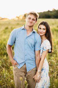 Georgia based wedding and couples photographer captures a beautiful summer engagement photoshoot in an open field filled with wildflowers at sunset. Showing the couple running through the field, picking flowers, and stealing kisses.    #summerengagement #wildflowerfield #georgiaengagementphotographer #engagementphotoideas #engagementoufitideas #coupleposinginspiration