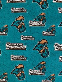 Coastal Carolina University Fabric, sold by the yard and is cut when you order it. Free US shipping. This fabric is very hard to find.  From Sykel Enterprises and 100% cotton and teal is the main color.