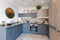 How stunning is the finish at our Westport Apartments at Green Park Village. We love the concrete effect laminate worktops with timber splashbacks