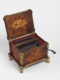 *1770 French Bird organ at the Victoria and Albert Museum, London - From the curators' comments: "Bird organs were used to teach caged birds to sing different tunes. The user would wind a handle, which pumped the bellows in a wind-box and simultaneously rotated a cylinder, used to control the air-supply to individual organ-pipes and thus produce different tunes. Different types of bird organ were used in France. This example is a serinette, which copied the sound of finches.":