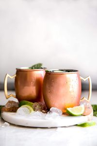 A twist to the traditional refreshing Vodka cocktail made with spicy ginger beer, guava nectar, fresh lime and sweet basil. Easy moscow mule recipe!