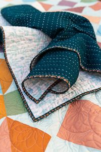 This fun tutorial from Suzyquilts.com give step-by-step instructions for making a wholecloth quilt using Kantha-style stitches. Wholecloth quilts go together so quickly and can be a great way to practice your hand quilting and show off beautiful fabrics that you can't bring yourself to cut into!