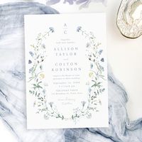 Elegant delicate watercolor wildflower wreath frames your event details, with couple monogram. Pastel palettes of soft yellow, off white, sage green, dusty blue, and botanical greenery, simple and romantic. Great floral wedding invitations for modern rustic wedding, country garden wedding, and boho wedding in spring and summer.