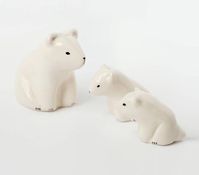 Mini white polar bear cub sculpture in ceramic.Handmade and handpainted, each mini white polar bear cub is unique.This gentle baby bear will bring some softness to your house.Height : around 5,5cm