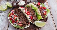 This dish from Rania Batayneh, MPH, author of The One One One Diet, only requires 15 minutes of hands-on time. “Making a roast in a Crock-Pot is perfect for tacos! There is so much flavor infused into the meat, and it is tender and easy to serve,” says Batayneh.