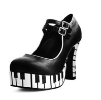 TUK Footwear Womens Black & White Piano Platform Mary Jane Heels Size 8,9.  New in box. From smoke free home. Style# a7099L/ Black Tune up your style in these playful mary jane platform heels from our Rewind Collection! Made of a vegan friendly black PU upper featuring white trimming, double buckle straps, and a piano-inspired design that will have you feeling like a maestro of style. Has a sturdy 4” heel height complemented by a 1 1/8” platform. - standard width. Size 8 or 9 Shipped USPS Priori