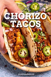 This is my favorite chorizo tacos recipe with spicy Mexican chorizo served over warmed corn tortillas with red onion, fresh cilantro, sliced peppers and creamy chipotle sauce.