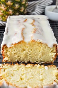 Pineapple Pound Cake is buttery cake w/ a tropical twist. Crushed pineapple gets added to a thick batter to make a moist and rich cake.