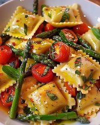 Ravioli with Tomatoes, Asparagus, Garlic, and Herbs Recipe