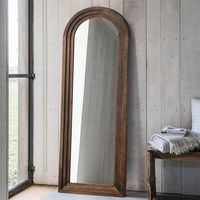 This full-length wall mirror is designed with a stepped wooden frame, makes a sleek, eye-catching addition to any modern bedroom or entryway. Mount it to your wall with the included screw kit, or lean your mirror up against the wall for a more casual look.