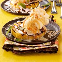 Grilled Pineapple Sundaes Recipe -I found a basic recipe for this luscious dessert online, and tweaked it with some "doesn't this sound amazing?" tidbits from a friend. It doesn't get much simpler than this! —Anita Beachy, Bealeton, Virginia