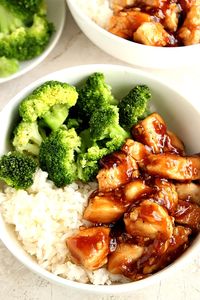 Quick Teriyaki Chicken Rice Bowls recipe - better than takeout and made with just a few ingredients, this Asian chicken dinner idea is on our weekly rotation! Sweet, garlicky chicken served with rice and steamed broccoli comes together in just 20 minutes.