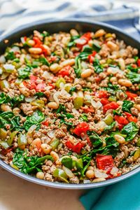 Italian ground turkey skillet with white beans, diced tomatoes and spinach is an easy, flavorful all-in-one-pan dinner that’s ready in just 25 minutes!