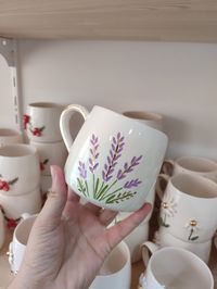 Discover the art of relaxation with our exquisite Lavender Mug, perfect for adding a touch of nature's beauty to your morning routine. Handcrafted with intricate lavender designs, this mug is your new favorite way to enjoy tea or coffee. Ideal for garden lovers and peace seekers alike! Let every sip take you to a field of blooming lavender. #LavenderLove #HandmadeMug #NatureInspired #CoffeeBreakBliss #GardenVibes #EnjoyCeramicArt