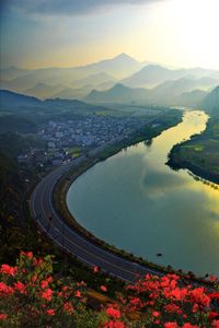 Mountains, fields, and traditional dwellings along Xin'an River in southern Anhui province.