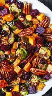 Autumn Salad with Brussels sprouts, Cranberries, Pecans, Beets, and Butternut Squash (or Sweet Potatoes). Perfect side dish in the Fall and Winter season. A great side dish for the holidays: Thanksgiving, Christmas, and New Year's Eve.