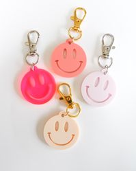 Keychain • Approx. 1.21" x 1.21" • Acrylic Tags: Smiley Face, Flower, Indie, Cute, Gift, iridescent, holograph, car hang, crystals, stocking stuffer, sun, moon, stars, mushrooms