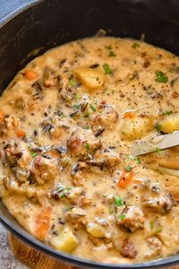 A typically chunky chowder conjures images of wind and rain-battered fishing boats. But there's not a clam in sight for this one! Swap out the traditional seafood for sausage and sink into a steaming bowl of hot creamy potato soup.