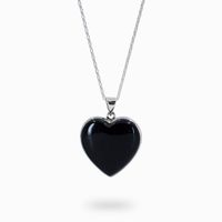 Onyx is a perfect gemstone for an everyday crystal necklace look. Wearing this cabochon heart Onyx necklace, set in a Sterling silver, supports happiness and good fortune by enhancing self-control, stimulating sensible decision-making, and encouraging happiness and good fortune. Allow this Black Onyx necklace assist you in taking control of your own destiny. Stone Origin: India Measures Approximately: 25 x 25mm Materials: Hand Crafted 925 Polished Sterling Silver Please Note: If you would like t