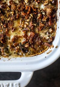 This brussels sprouts gratin is heaven in a dish! It's super flavorful, delicious and comes together to create a fabulous side dish for Thanksgiving or the holidays. Pancetta and cheese turn this in to flavor town - you won't be able to stop eating it! I howsweeteats.com #brusselssprouts #gratin