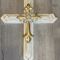 Wooden White Distressed Cross With Gold Cross In The Center. Cross Measures 19 3/4" X 15 5/8" X 2".