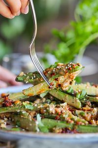 This salad is inspired by the classic Pai Huang Gua, it brings together crunchy cucumbers, roasted peanuts, and spicy chili oil. It's a lively and texturally pleasing salad, perfect as a zingy appetizer or a flavourful side dish.