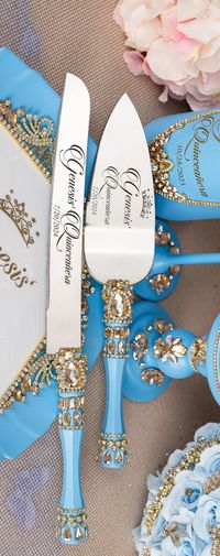 A quinceanera Cake Knife and Server set in Light Blue Gold color, perfect for quinceañera celebrations!  What makes this set truly special is the option for personalization, allowing you to put on names, dates, or special messages, making it a cherished keepsake for the quinceañera princess. It's a stylish keepsake that is both functional and meaningful, perfect for cutting and serving the quinceañera cake. quinceañera theme, quinceañera decoration, quinceañera ideas, sweet 15 party ideas