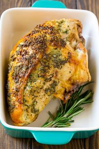 This roasted turkey breast is coated in a savory garlic and herb butter, then baked to golden brown perfection.