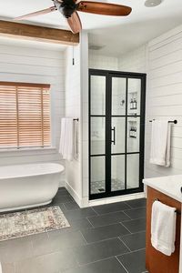 This Gridscape® GS1.2 Crittall / industrial style grid pattern shower door with clear tempered glass is a true statement piece of the bathroom blending high style and function. They have been widely embraced, not just by designers and those in the industry, but by individuals looking to add a little flair to their bathroom design. It can be intermixed with an endless number of tastes and styles ranging from industrial modern/steampunk to rustic shabby chic.