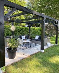 Dark wood pergola - DIYs.com