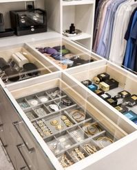 Embrace your space. Designed in a crisp white finish, this beautiful walk-in features a glass-top jewelry display case atop a convenient center island and illuminated open shelving.
​
​#CaliforniaClosets #CustomClosets #WalkInCloset #ClosetOrganization #ClosetDesign #ClosetInspo 