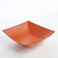 Orange leather bowl with stitches. Handmade in Italy. Bowls decor, Bowls decor ideas, contemporary decor, contemporary home decor, contemporary kitchen decor, fall home decor ideas, modern contemporary kitchen decor ,contemporary home decor ideas, contemporary decor ideas, contemporary art and decor, modern decor, modern decor ideas, modern home decor ideas, modern home decor living room