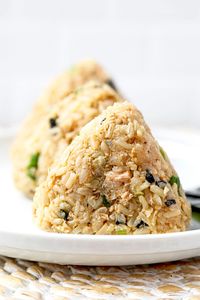 Canned tuna mixed with sesame seeds and crunchy scallions make this omusubi recipe packed with savory and nutty flavors!