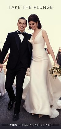 Plunging necklines are the latest wedding dress trend. Explore plunging neckline wedding gowns by Justin Alexander.