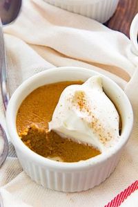 This Crustless Pumpkin Pie pudding is so satisfying and silky smooth that you won't miss the crust at all! It;s Gluten free and refined sugar free too. #GlutenFreePumpkinPie #CrustlessPumpkinPie #ThanksgivingDesserts #EasyRecipes