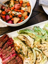 Corned beef and cabbage with potatoes and carrots this elevated recipe on a traditional Irish meal is perfect for St. Patrick's Day.