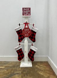 FREE SHIPPING. accessories sold separately.  DIMENSIONS: Posts can be made up to 48 inches tall or under. I can add as many pegs for stockings as you would like. Colors, paint, and stain is customizable. Message me.  This is a four stocking wood banister post that is white with a distressed look. You can hang more than four stockings on it because it has the front hook. Also has a cute shelf on the top to decorate with and place cute items!  Items on the post can be purchased separately. Message me if interested in Christmas accessories, or with any questions. All posts can be customized with your own color choices. See my other listings for ideas 💡.  Posts are 48 inches tall. Wood posts are sturdy and heavy. They will not tip over, and are packaged very well upon delivery.  Merry Christm