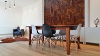 Tempered Robusto Leather Tiles installed as an accent wall in this contemporary kitchen.