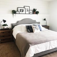 I wanted a shelf above my bed but *earthquakes* so we created a faux wall with a built-in ledge, covered it in shiplap and I got the look…