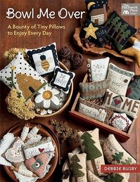 Stitch 'em up, pile 'em high, and enjoy! These sweet little pillows from Debbie Busby are irresistibly fun to stitch! Thirty petite bowl fillers are a snap to make with Debbie's easy wool-applique techniques, embroidery stitches, and finishing steps.