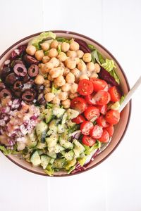 A delicious, vegan take on a classic Chopped Italian Salad with a creamy, oil free dressing. Gluten free, refined sugar free and oil free.