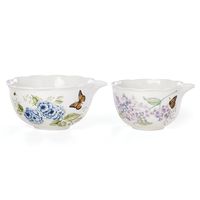 Crafted of durable white ceramic porcelain, the Butterfly Meadow 2-piece Nesting Bowl Set features a bright and vibrant motif of butterflies and blossoming flowers. Ideal for mixing and preparing a meal, this set is microwave and dishwasher-safe, for added convenience.