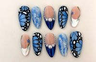 Handmade Gel Press-ons, made to order!  -Gel Polish -Pearl Charms, Blue Chrome Powder, Blue Glitter Powder  Sizes range from (1 to 10) ( Ask for ) thumb (0-3) Ex: 0 pointer (4-7) Ex: 5 middle (3-6) Ex: 4 ring (4-7) Ex: 5 pinky (7-10) Ex: 8 Includes: Set of 10 nails Nail Glue Sticky Tabs