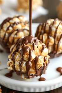 Peanut butter popcorn balls are a delightful fusion of sweet and salty. They offer a chewy yet crunchy bite, and they couldn't be easier to make. 