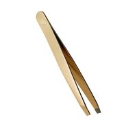 High Performing tweezer for beautifully arched brows. and precise lines. Crafted from highest quality stainless steel, this gold coloured tweezer grasps even the tiniest hairs at the root. The angled tip enables you to grab every single hair with comfort and ensures ultimate precision so that you can create flawless brows.  9.5x1x1.48cm (37457)