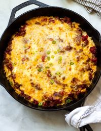 This homestyle ground beef casserole recipe is the bomb! So easy to make and freaking good! The fam loves it!